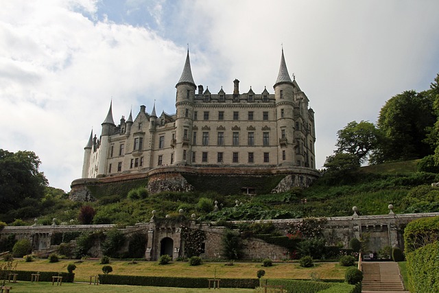 Dunrobin Castle, an iconic fairytale-style castle surrounded by manicured gardens.